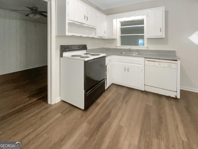 828 Pinevalley Dr, Forest Park, GA 30297 - kitchen with dishwasher, electric stove, a sink, dark wood finished floors, and white cabinetry