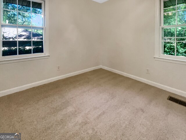 view of carpeted spare room