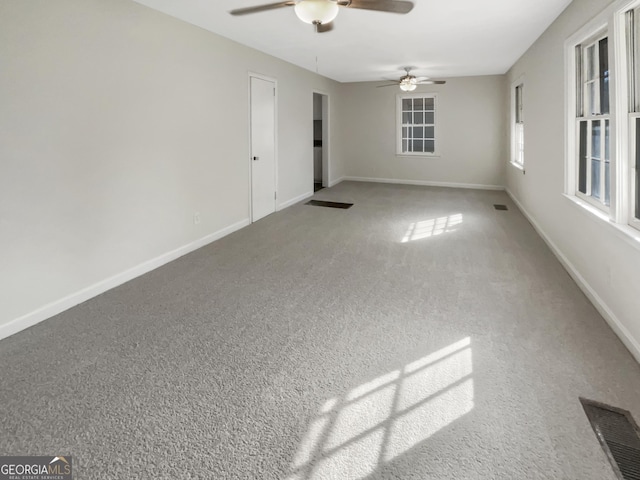 828 Pinevalley Dr, Forest Park, GA 30297 - carpeted empty room featuring a ceiling fan and baseboards