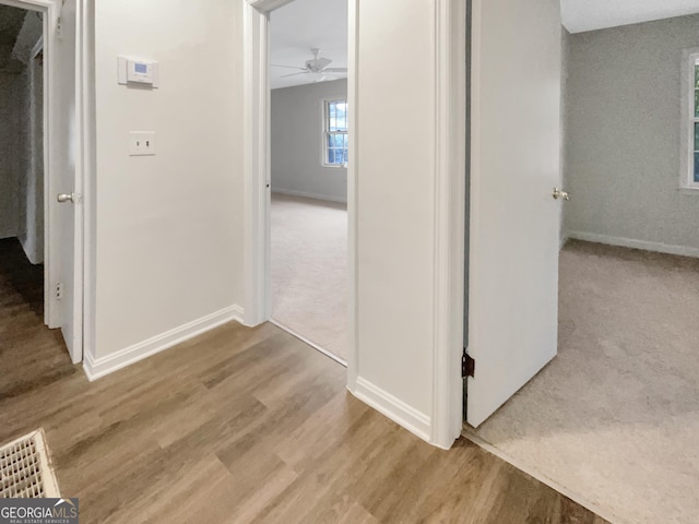 828 Pinevalley Dr, Forest Park, GA 30297 - corridor with wood finished floors and baseboards
