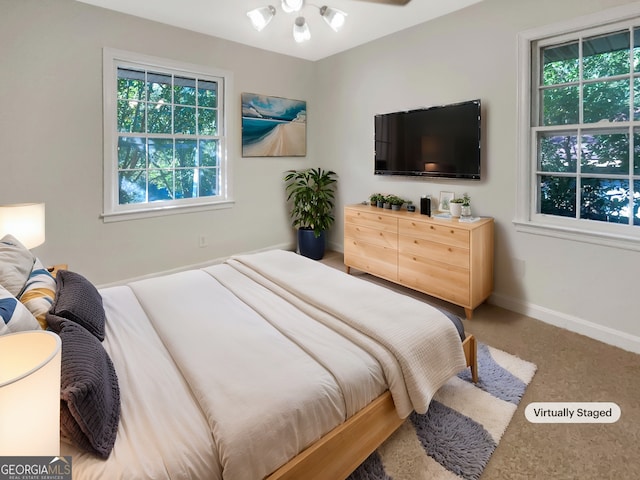 828 Pinevalley Dr, Forest Park, GA 30297 - carpeted bedroom featuring baseboards