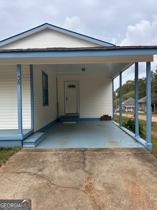 view of front of property with a carport