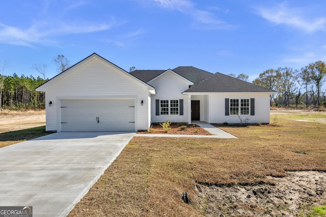 ranch-style house featuring a garage