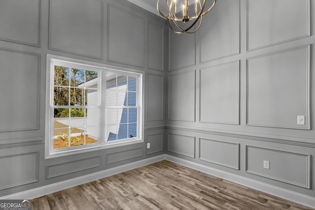 clothes washing area with cabinets, dark hardwood / wood-style floors, hookup for a washing machine, and electric dryer hookup