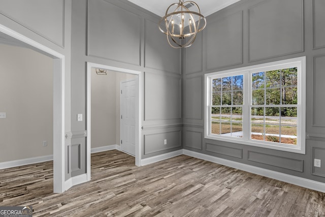 carpeted spare room featuring ceiling fan and a textured ceiling