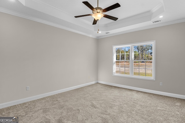 carpeted spare room featuring a textured ceiling and ceiling fan