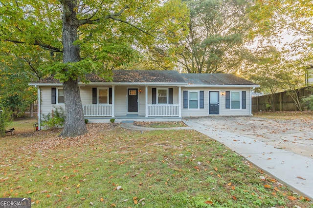 ranch-style house featuring covered porch