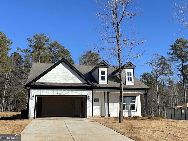 view of front facade with a porch and a garage