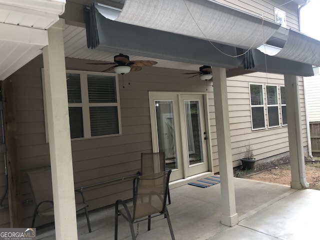 view of patio / terrace featuring ceiling fan