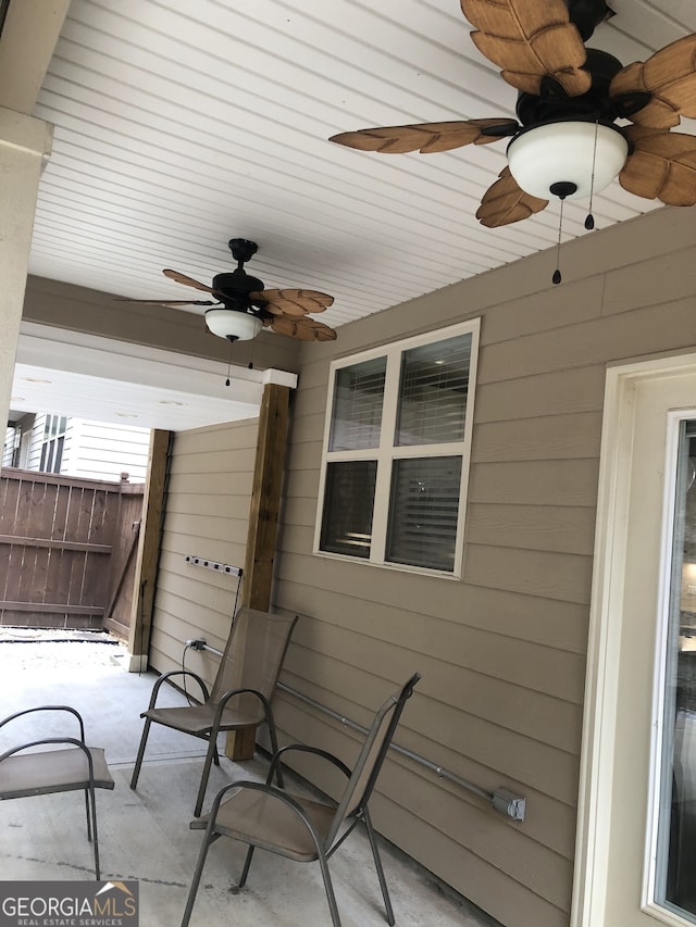 view of patio featuring ceiling fan