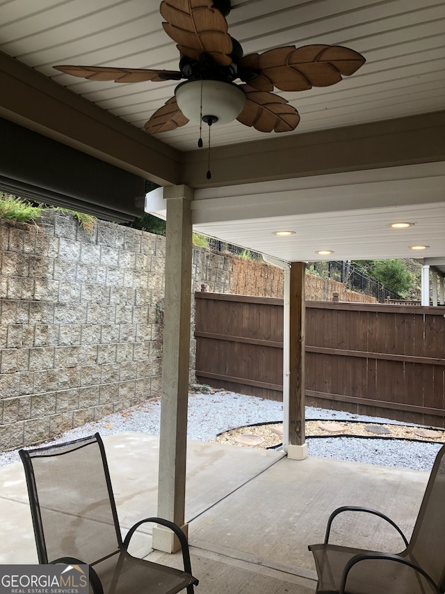 view of patio featuring ceiling fan