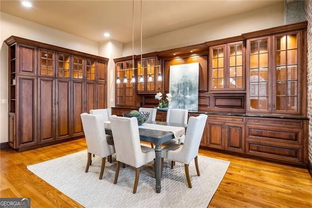 dining room featuring light hardwood / wood-style floors