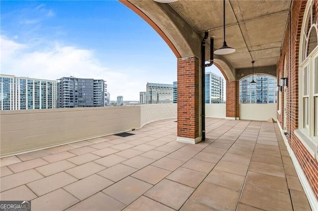 view of patio / terrace with a balcony