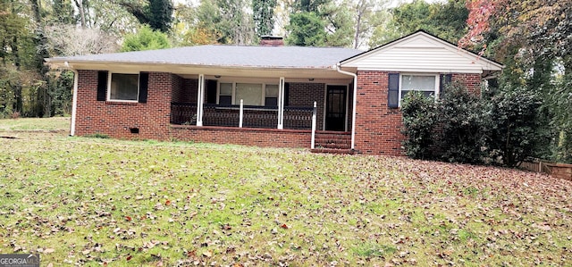 ranch-style home featuring a front yard