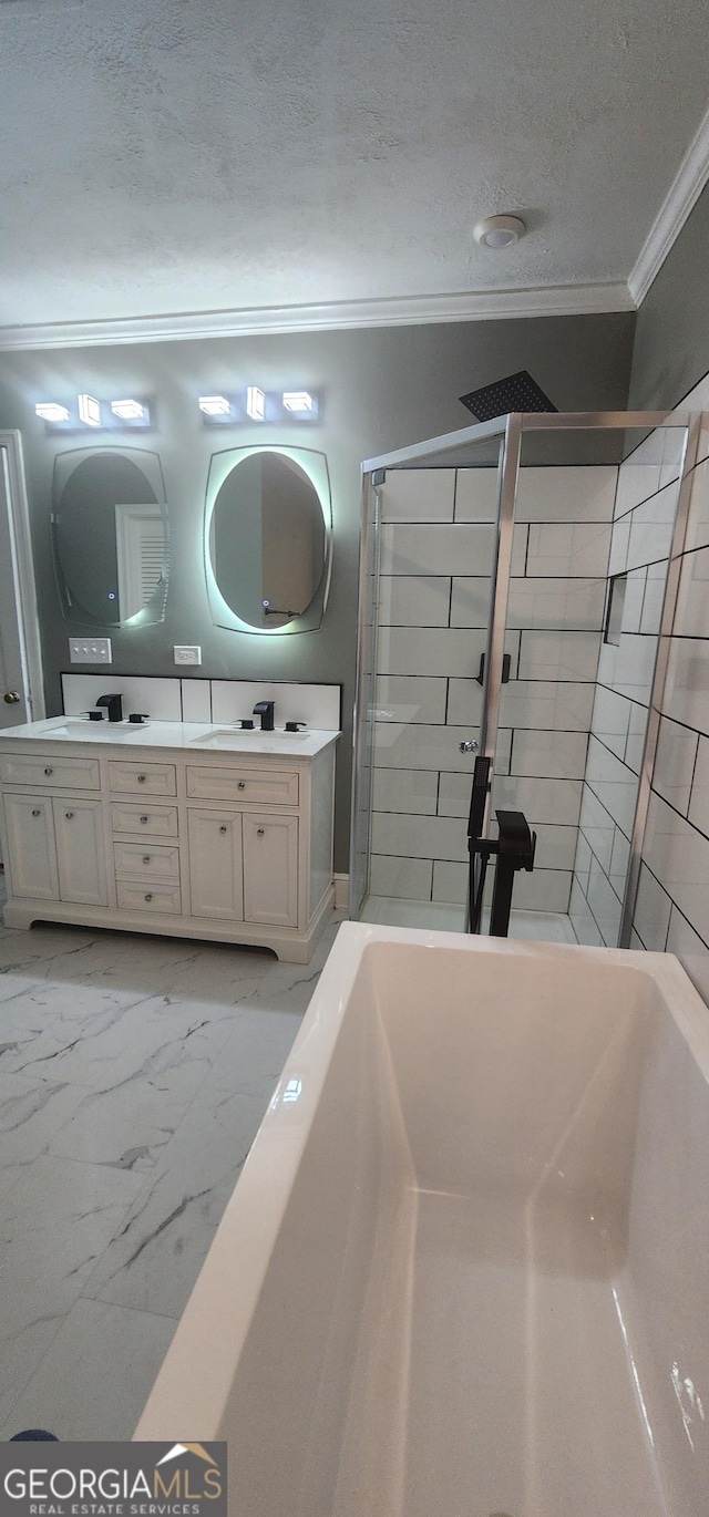 bathroom featuring crown molding, vanity, a textured ceiling, and shower with separate bathtub