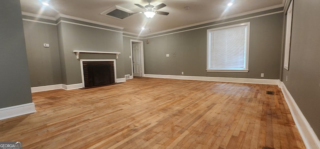 unfurnished living room featuring a fireplace, light hardwood / wood-style floors, ceiling fan, and ornamental molding