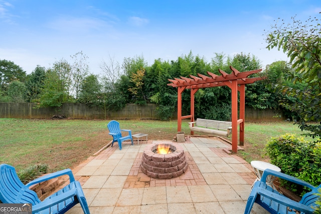 view of patio with an outdoor fire pit and a pergola