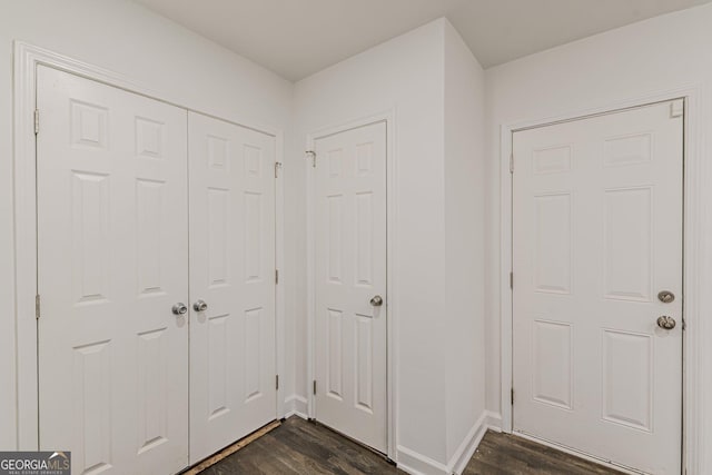 entrance foyer with dark hardwood / wood-style flooring