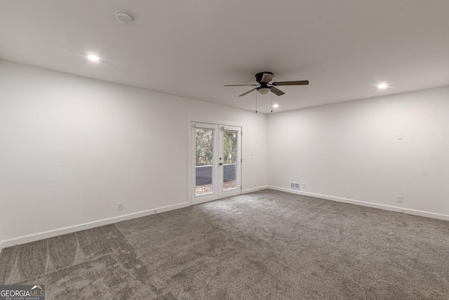 spare room with ceiling fan, carpet floors, and french doors