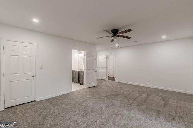 interior space with ceiling fan