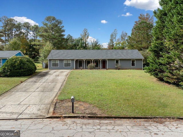 ranch-style house featuring a front lawn