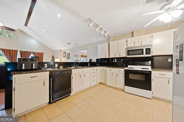 kitchen with lofted ceiling, white cabinetry, light tile patterned flooring, and white appliances