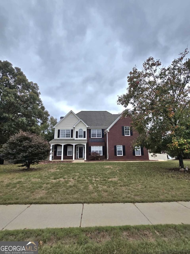 view of front of house with a front yard