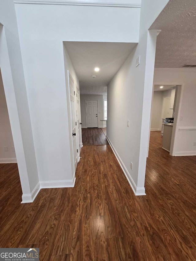 hall featuring dark hardwood / wood-style floors