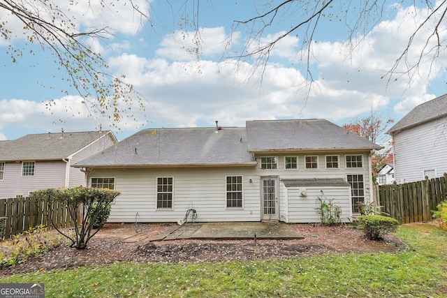 back of house featuring a patio