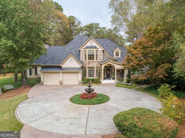 view of front of property featuring a garage