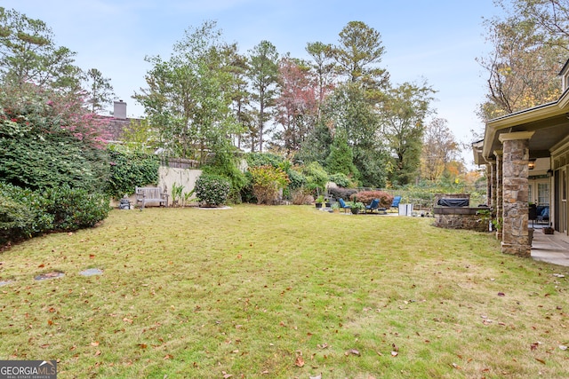 view of yard with a patio area