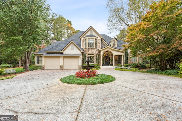 view of front of property with a garage