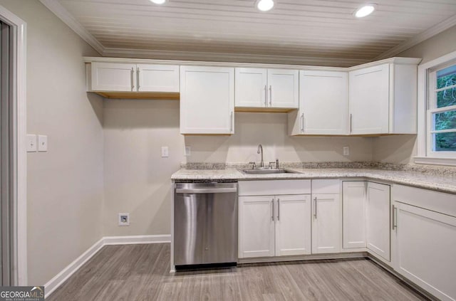 kitchen with white cabinets, sink, light hardwood / wood-style flooring, and dishwasher