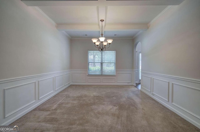 carpeted empty room with a notable chandelier, crown molding, and beam ceiling