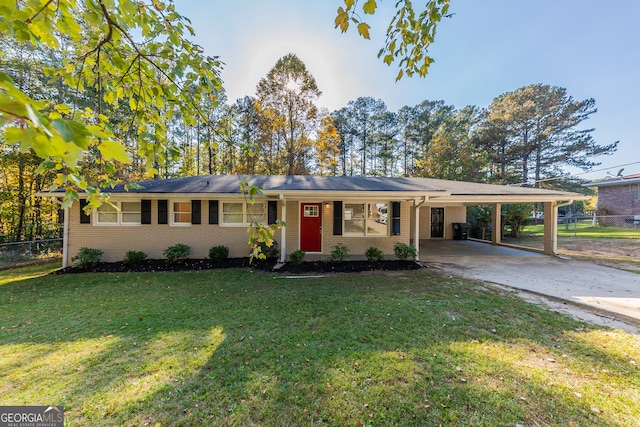 single story home featuring a carport and a front yard