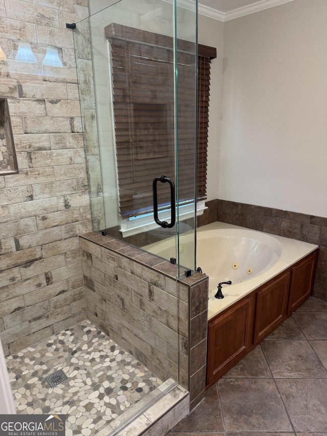 bathroom featuring crown molding, shower with separate bathtub, and tile patterned floors