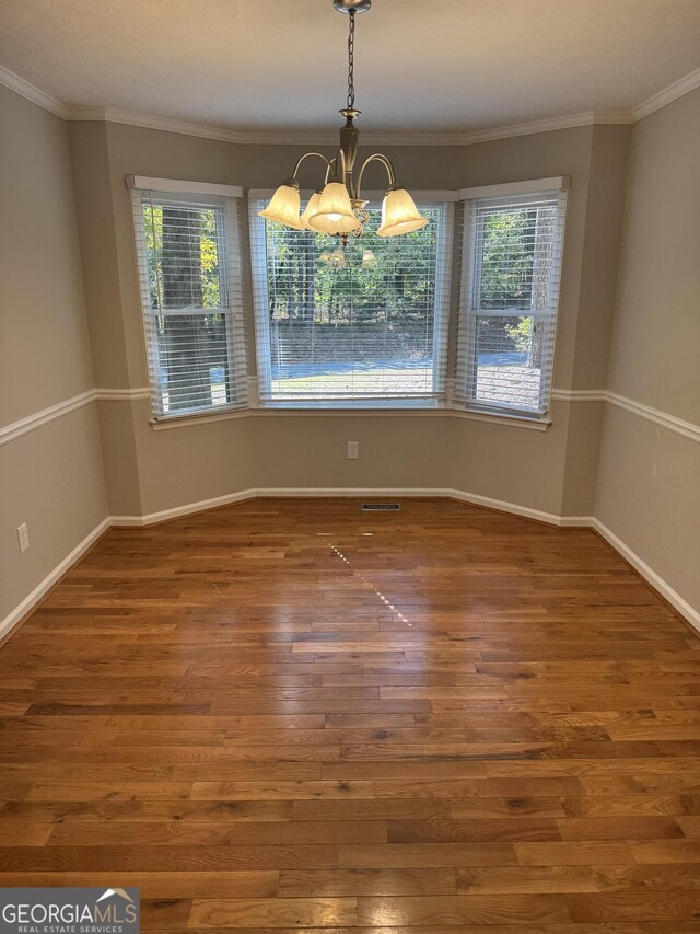 bathroom featuring crown molding, vanity, toilet, and tile patterned flooring