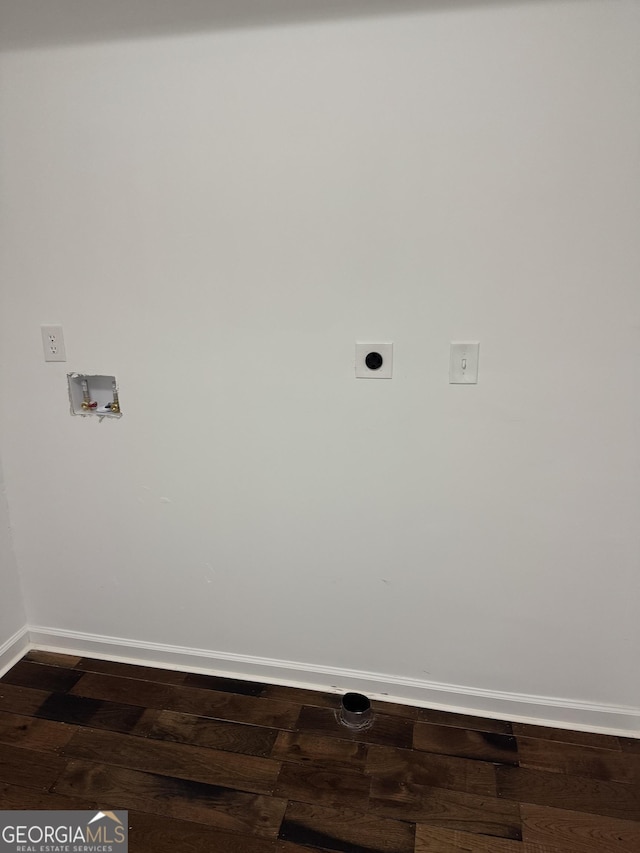 clothes washing area with hookup for a washing machine, wood-type flooring, and electric dryer hookup