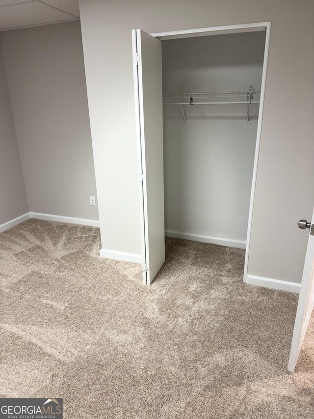 bathroom featuring a shower with curtain, vanity, toilet, and a textured ceiling