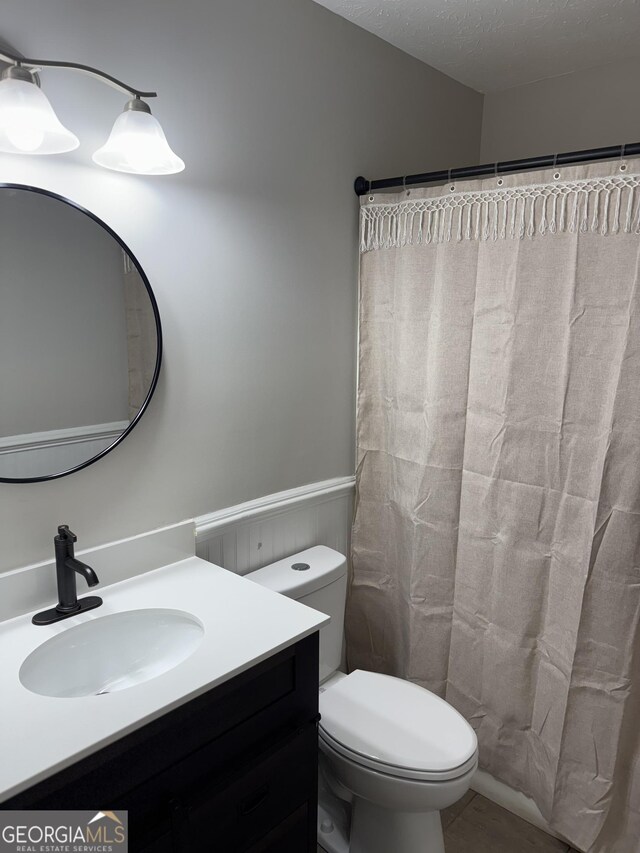 clothes washing area with washer hookup, dark hardwood / wood-style floors, and electric dryer hookup