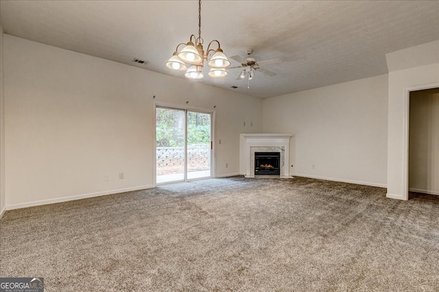 unfurnished living room with ceiling fan, a textured ceiling, carpet flooring, and a high end fireplace