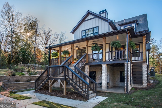 exterior space featuring central AC unit, ceiling fan, a yard, and a patio