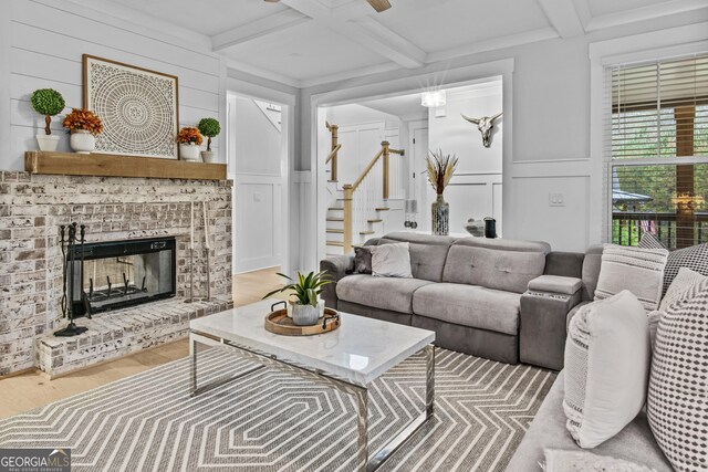 265 Federal St, Athens, GA 30607 - living area with a decorative wall, stairs, beam ceiling, wood finished floors, and coffered ceiling