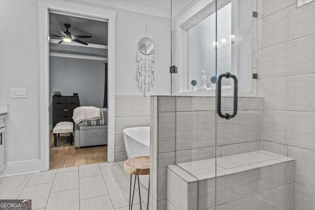 265 Federal St, Athens, GA 30607 - full bath featuring a shower stall, ceiling fan, tile walls, and a soaking tub