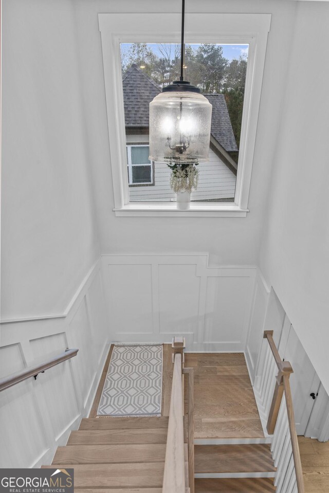 265 Federal St, Athens, GA 30607 - stairs with a decorative wall, plenty of natural light, wainscoting, and wood finished floors