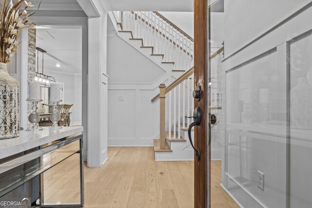 265 Federal St, Athens, GA 30607 - entryway with hardwood / wood-style floors, stairway, and a decorative wall