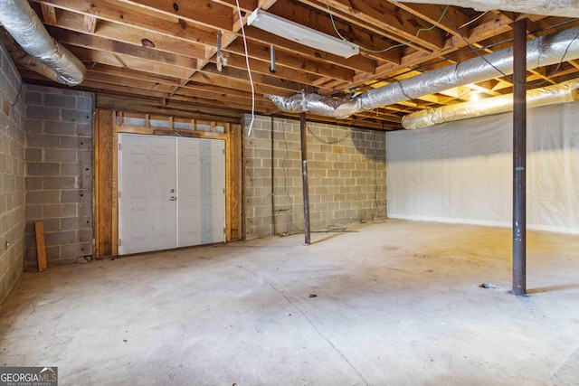 117 Neal Ave, Stockbridge, GA 30281 - unfinished basement with concrete block wall
