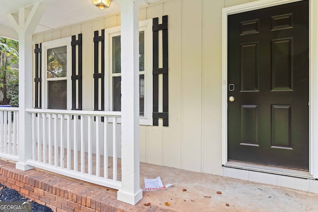 entrance to property with a porch