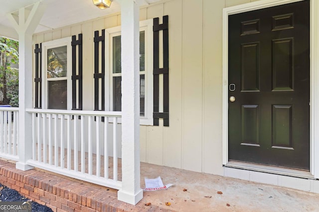 117 Neal Ave, Stockbridge, GA 30281 - view of exterior entry featuring a porch