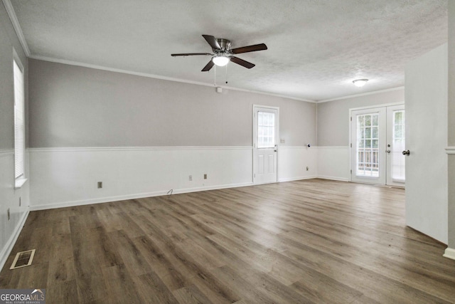 117 Neal Ave, Stockbridge, GA 30281 - empty room with ceiling fan, crown molding, wood finished floors, and a textured ceiling